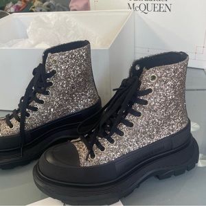 Alexander McQueen
Tread Slick glitter boots NWB.